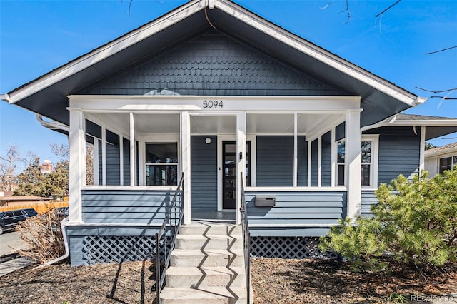 bungalow-style home featuring a porch