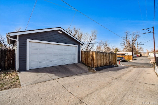 detached garage with fence