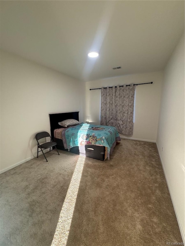 bedroom featuring carpet floors