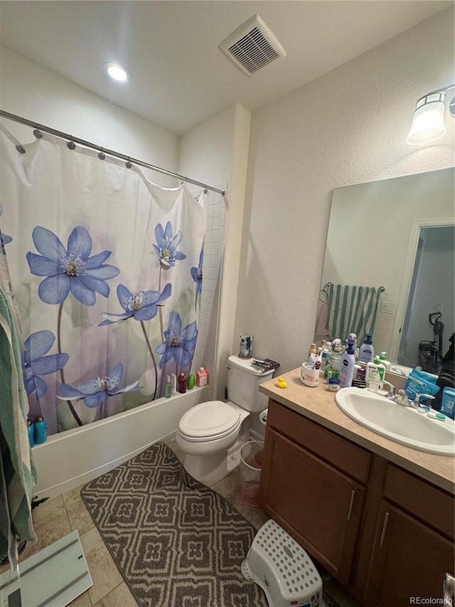 full bathroom with tile patterned flooring, vanity, shower / tub combo with curtain, and toilet