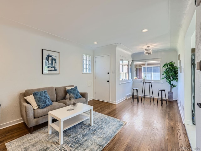 living room with dark wood-type flooring