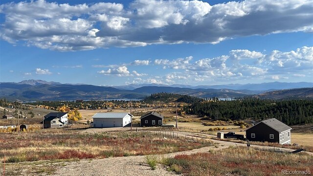 property view of mountains featuring a rural view