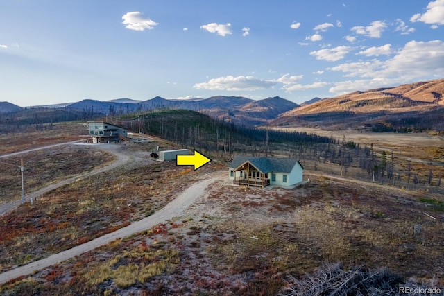 view of mountain feature with a rural view