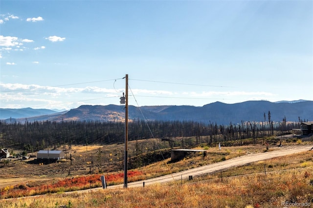 property view of mountains with a rural view