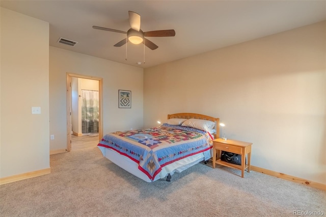 bedroom with a ceiling fan, baseboards, carpet, and visible vents