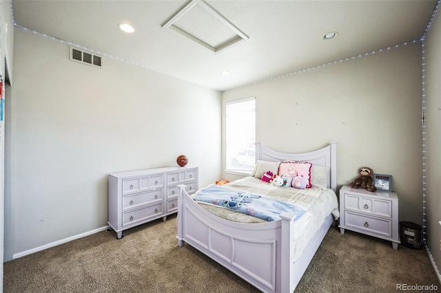 carpeted bedroom featuring attic access, recessed lighting, visible vents, and baseboards