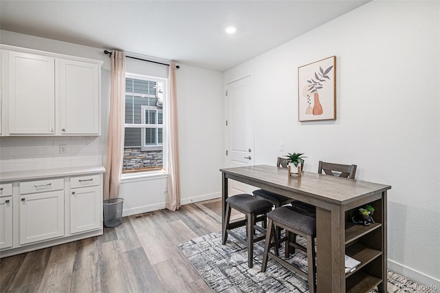 dining area with light wood-type flooring