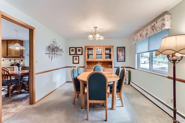 dining room featuring baseboards, a notable chandelier, light carpet, and baseboard heating