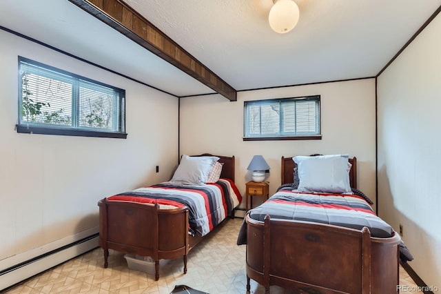bedroom with light floors and a baseboard radiator