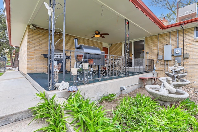 view of patio / terrace featuring a ceiling fan and grilling area