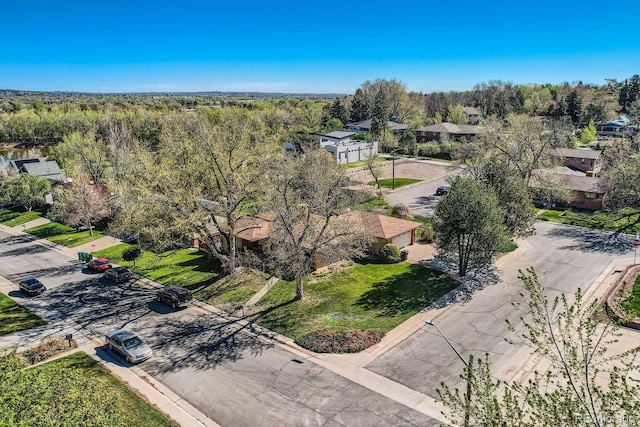 drone / aerial view with a view of trees
