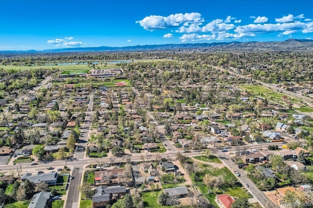 bird's eye view with a residential view and a mountain view