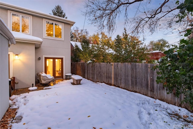 view of yard covered in snow