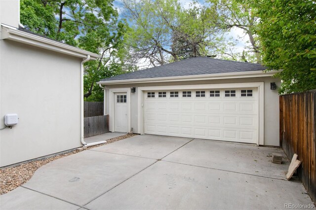 detached garage with fence