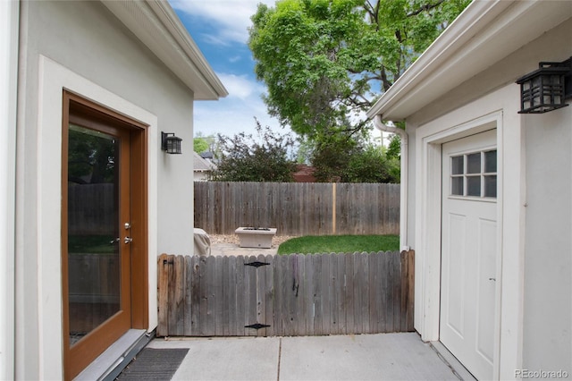 view of patio featuring fence
