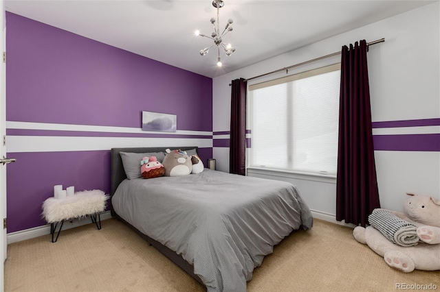 bedroom featuring baseboards, a notable chandelier, and light colored carpet