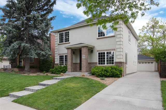1385 Birch St, Denver, CO 80220 - traditional-style home featuring brick siding, stucco siding, a front yard, a garage, and an outbuilding