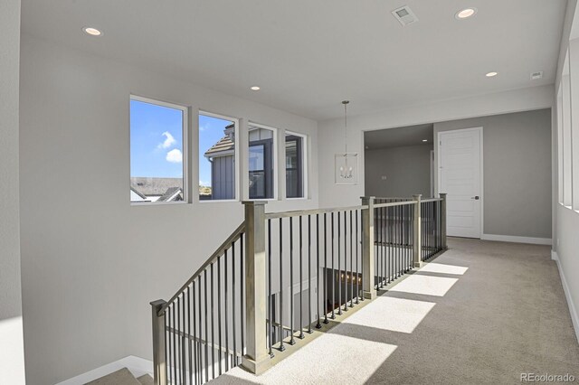 stairs with carpet flooring