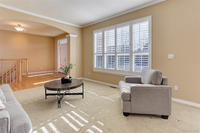 living room featuring ornamental molding and hardwood / wood-style floors