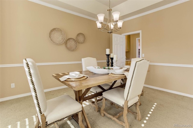 carpeted dining room featuring an inviting chandelier and ornamental molding