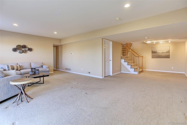 living room featuring light colored carpet