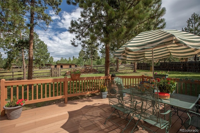 deck featuring a yard