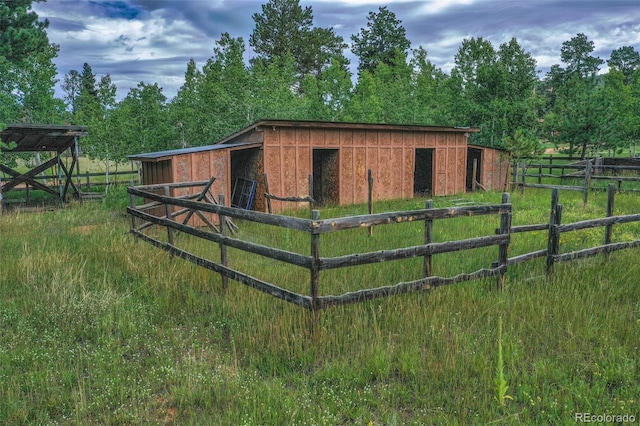 view of outbuilding with a rural view