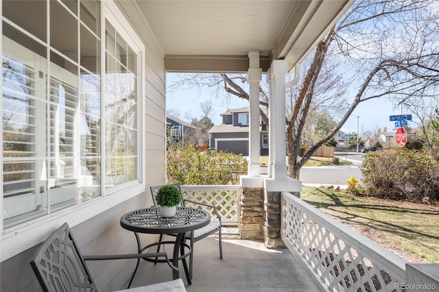 balcony featuring a porch