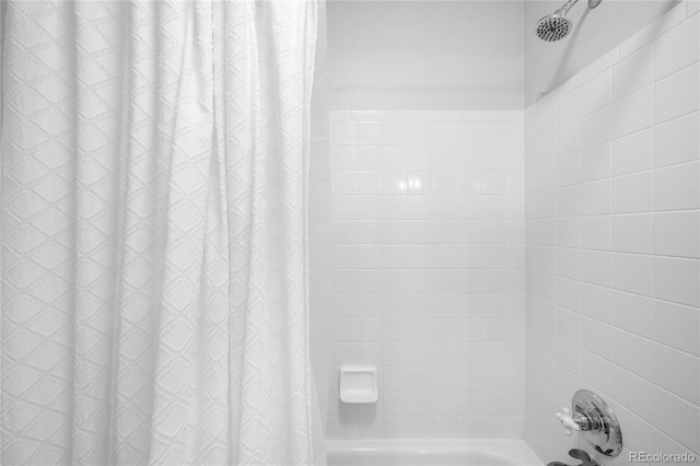full bathroom featuring shower / bath combination with curtain