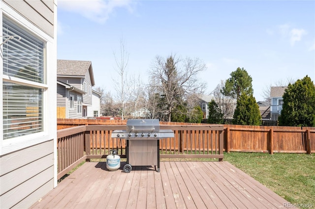 deck featuring a grill and fence private yard