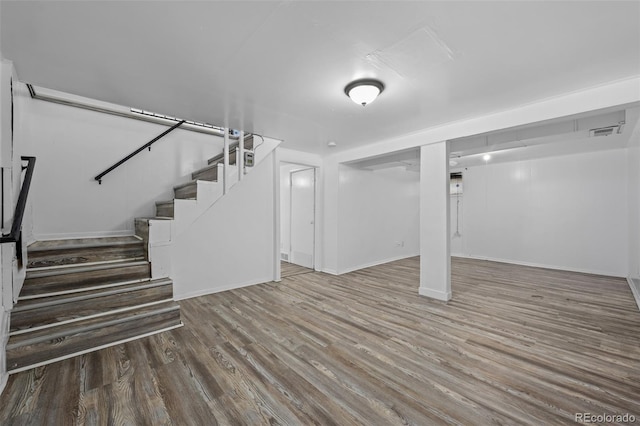 3715 N Jackson St, Denver, CO 80205 - finished basement with wood finished floors, stairs, and baseboards