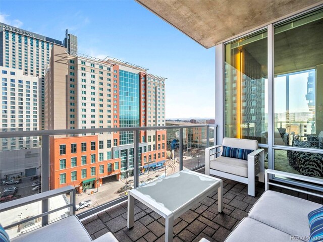 balcony featuring a city view