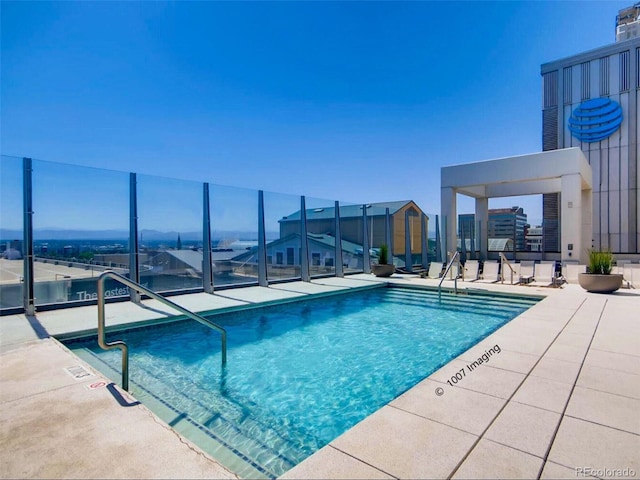 community pool with a patio