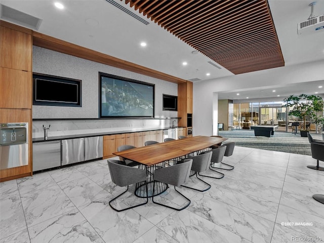 dining space featuring recessed lighting, visible vents, and marble finish floor