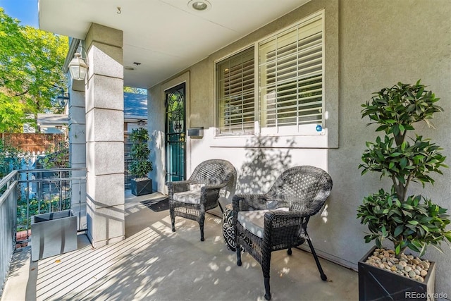 view of patio / terrace with a balcony