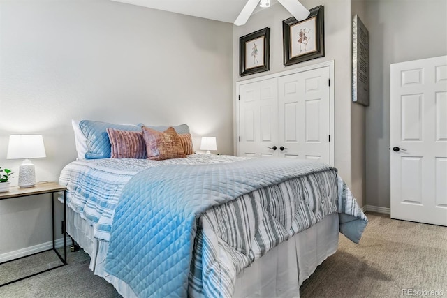 bedroom featuring ceiling fan, a closet, carpet, and baseboards