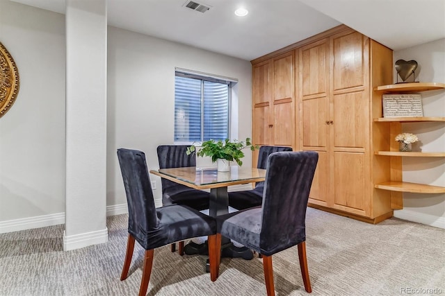 dining room with baseboards, recessed lighting, visible vents, and light colored carpet