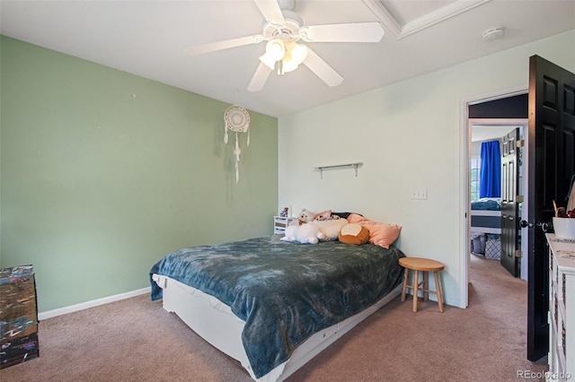 carpeted bedroom with ceiling fan