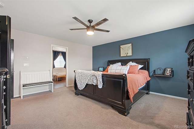 bedroom featuring ceiling fan and light colored carpet