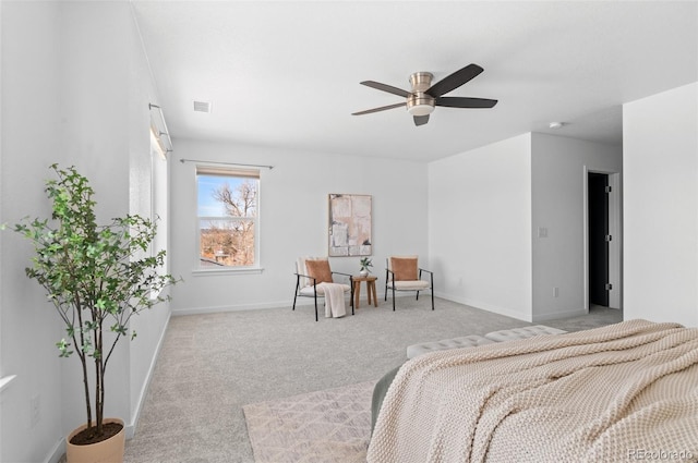 bedroom featuring carpet flooring, a ceiling fan, and baseboards