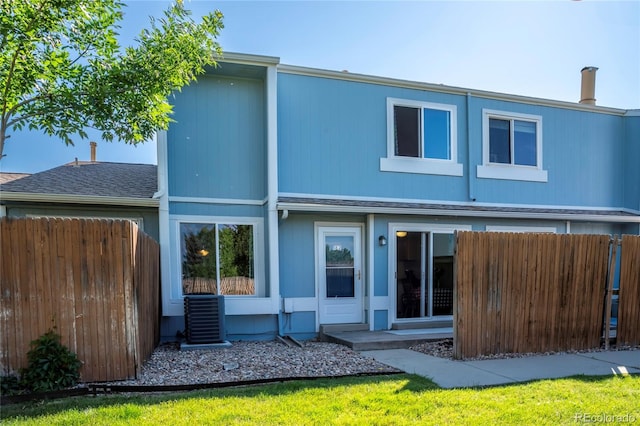 7933 Chase Cir Unit 182, Arvada, CO 80003 - back of house featuring a shingled roof
