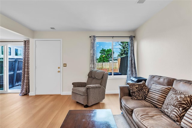 7933 Chase Cir Unit 182, Arvada, CO 80003 - living room with light wood-type flooring and baseboards
