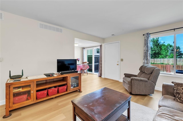 7933 Chase Cir Unit 182, Arvada, CO 80003 - living area with light wood-style floors and baseboards