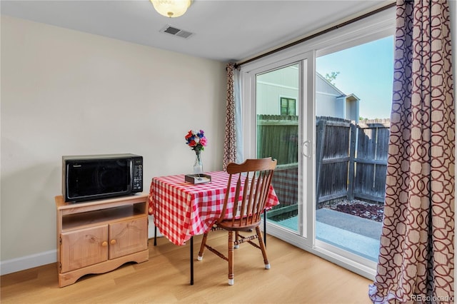7933 Chase Cir Unit 182, Arvada, CO 80003 - dining space with light wood finished floors and baseboards