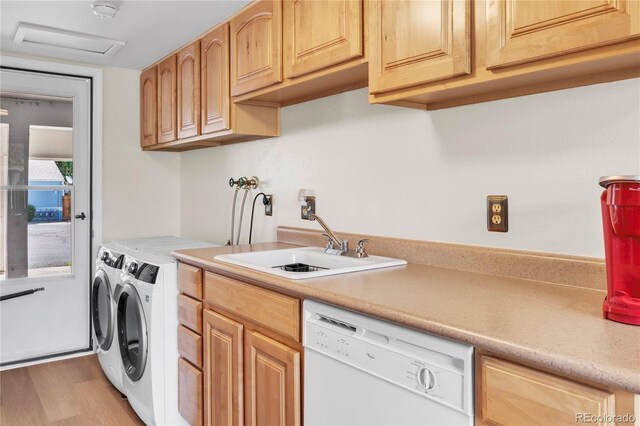 7933 Chase Cir Unit 182, Arvada, CO 80003 - laundry room with independent washer and dryer and light wood-type flooring