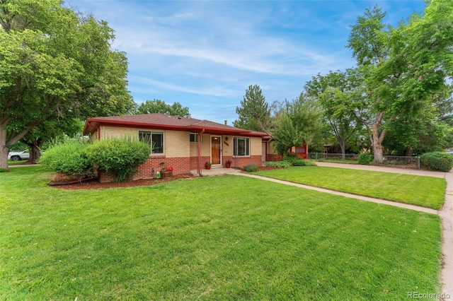 8675 Calvin Dr, Arvada, CO 80002 - ranch-style house featuring brick siding