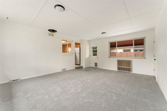8675 Calvin Dr, Arvada, CO 80002 - unfurnished living room featuring carpet flooring