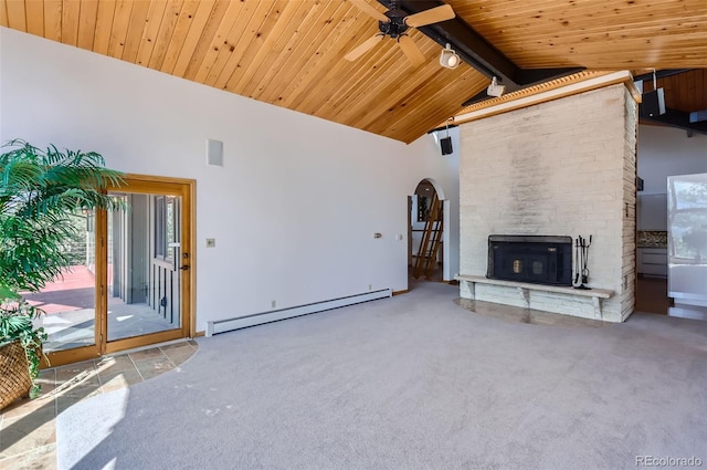 unfurnished living room featuring a fireplace, beam ceiling, a baseboard heating unit, and high vaulted ceiling