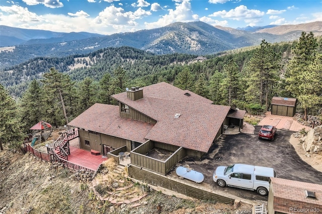 drone / aerial view featuring a mountain view