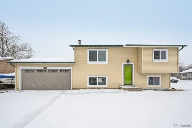 raised ranch with a garage